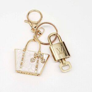 Authentic Louis Vuitton Lock & Key with unbranded White Bag Keycharm 11122025